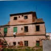 Vista de fachada interior al patio antes de la restauración